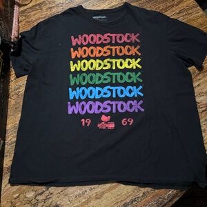 Woodstock Black T-Shirt with Rainbow Text